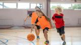 Children playing basketball