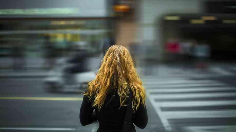 Woman crossing the road
